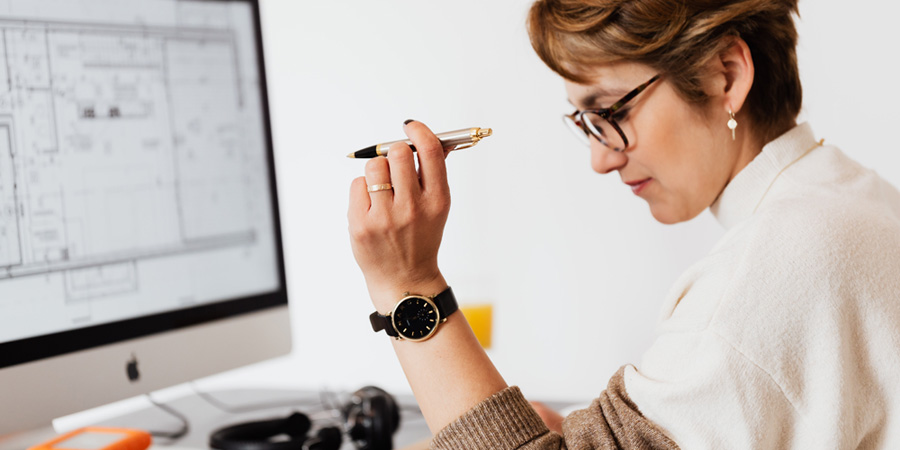 A woman thinking How to Boost E-commerce Sales during Covid-19